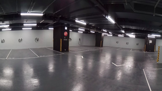 Tesla Shows What the Parking Garage of the Future Could Look Like<em></em>